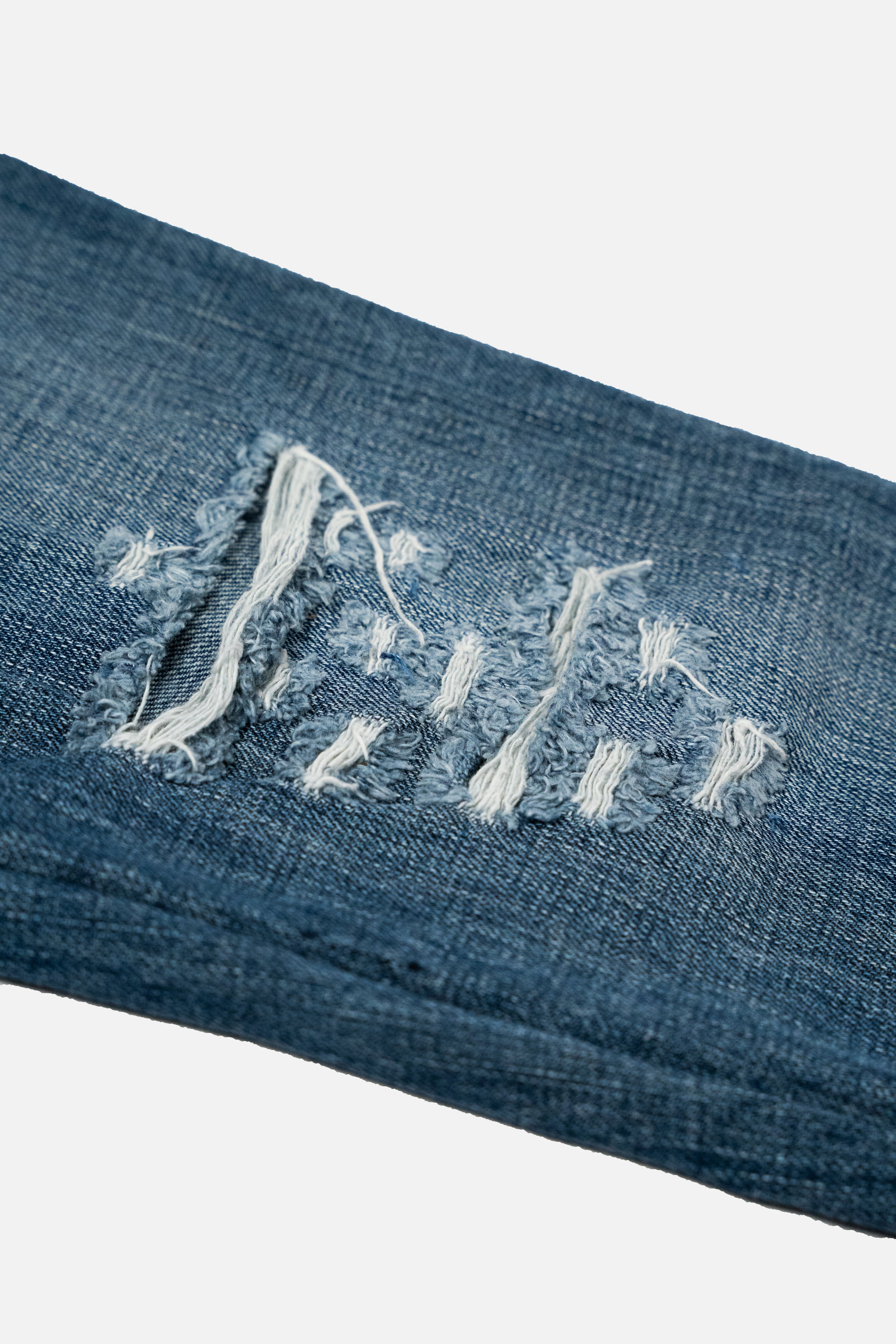 Dolce & Gabbana Distressed DG Logo Embroidered Jeans